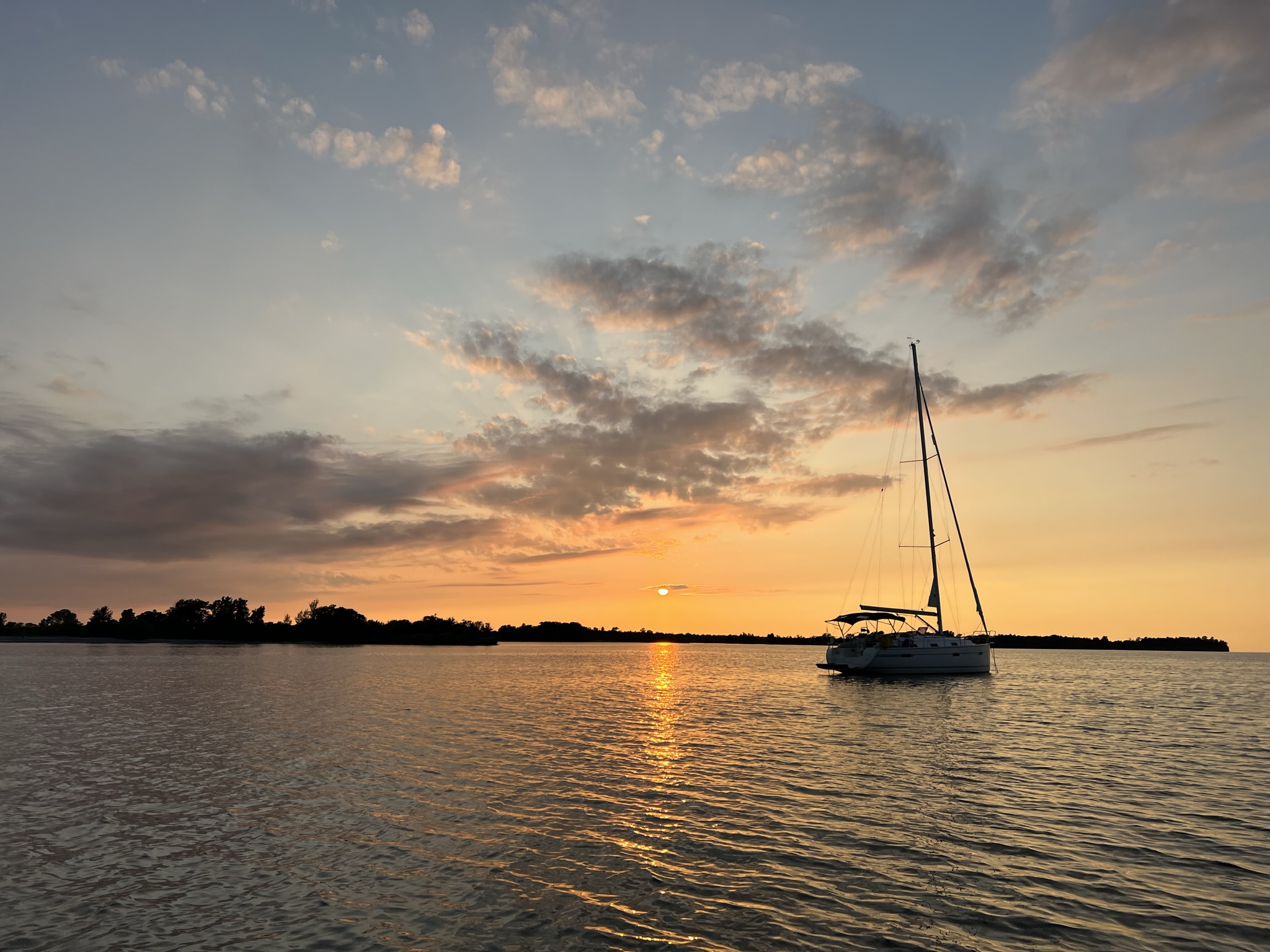Sailboat anchored at sunset in Prince Edward County, Ontario